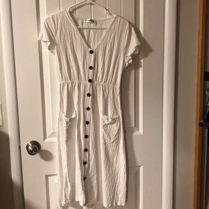 White midi dress with brown buttons